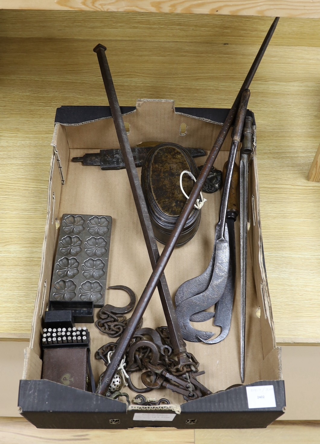 A 19th century steelyard, bayonet, two long-handled pokerwork blades, oval brass box, etc.